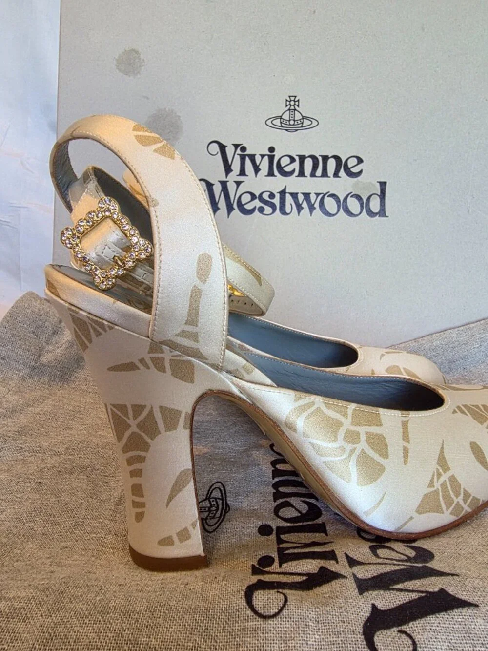 VIVIENNE WESTWOOD IVORY & GOLD PRINT PLATFORM ANKLE STRAP HEELS